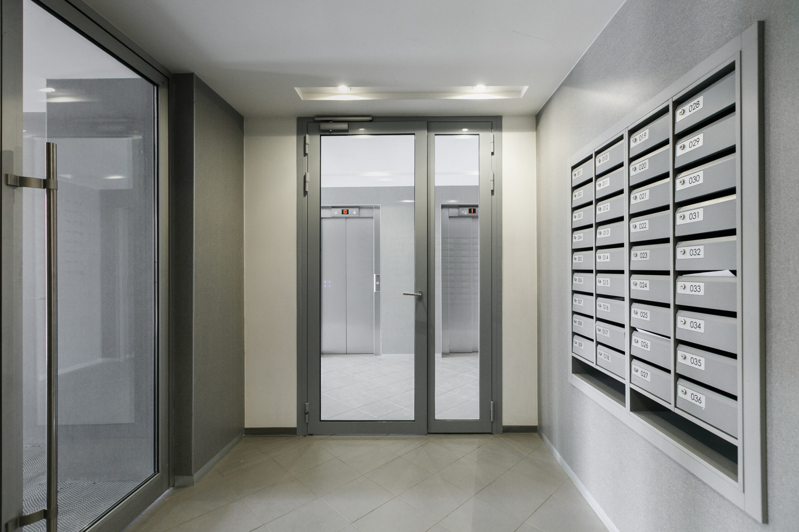 mailboxes in the lobby of an apartment building